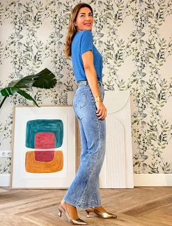 Jeans más bolsillos claro
